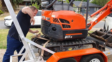 how to strap down a mini excavator|strapping adelaide mini excavators down.